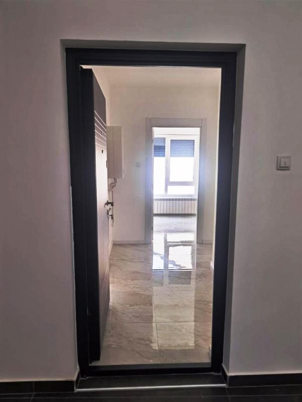 Slika 5 - Nov neuseljavan, nenamešten dvoiposoban stan sa parkingom na odličnoj lokaciji kod Doma zdravlja